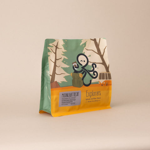 Angled view of Sipnode Moonlight Decaf whole bean coffee bag featuring naturally decaffeinated Colombian coffee from the Explorers collection.