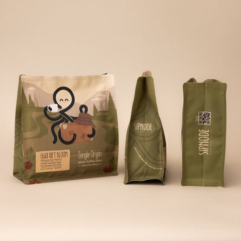 Front, left side and right side views of Sipnode Guji Rift Bloom single origin coffee bag from Guji, Ethiopia.